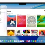 Giao diện macOS Tahoe 26 với thiết kế Liquid Glass, thanh menu trong suốt và ứng dụng Music mở.