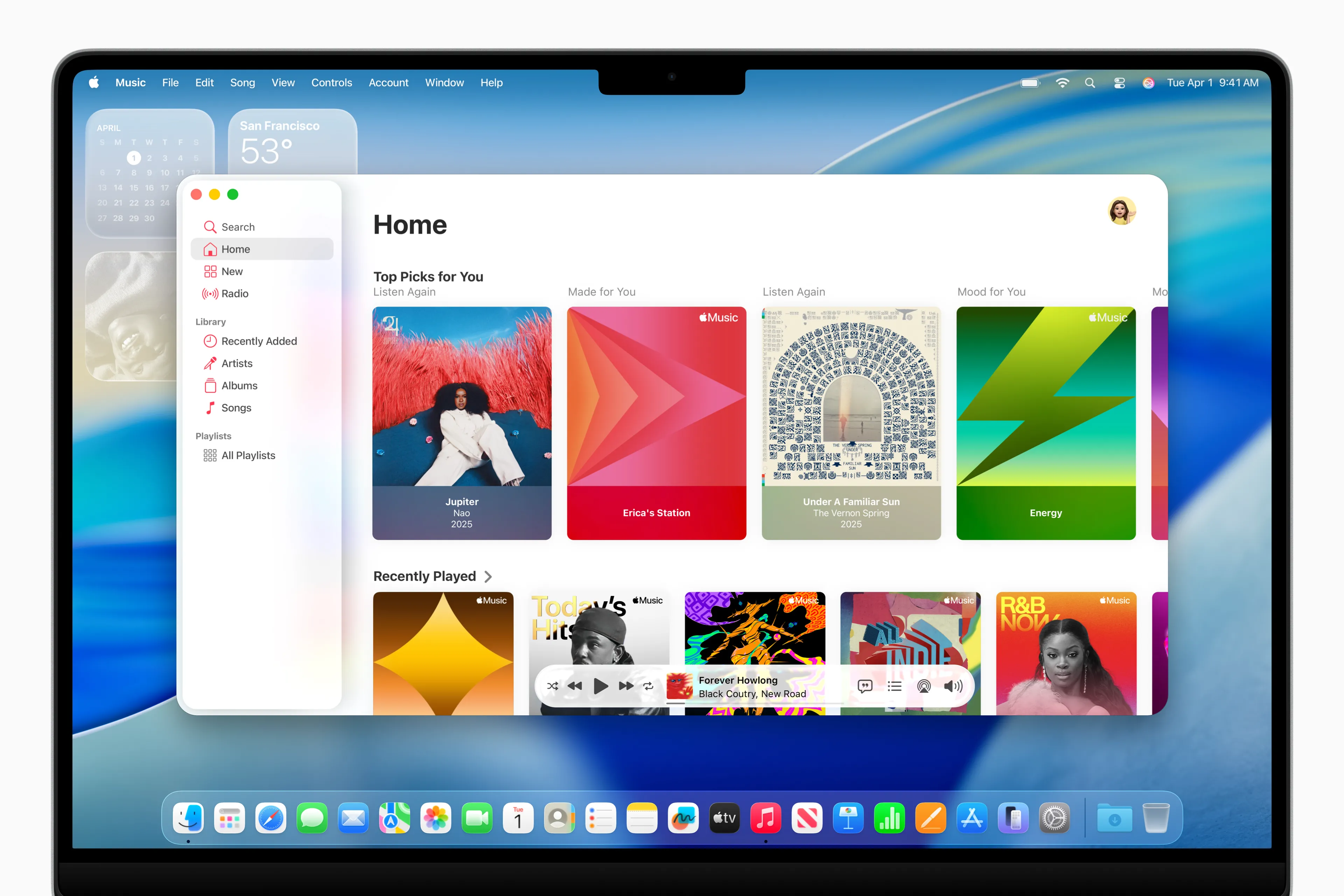 Giao diện macOS Tahoe 26 với thiết kế Liquid Glass, thanh menu trong suốt và ứng dụng Music mở.