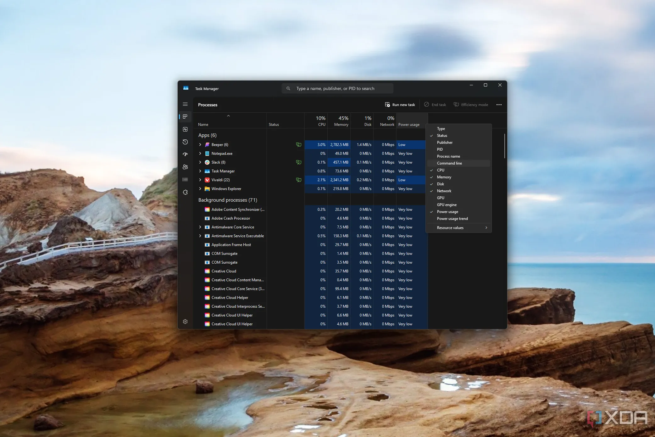 Giao diện tab Processes của Task Manager mặc định trên Windows với menu tùy chọn hiển thị thêm các cột thông tin