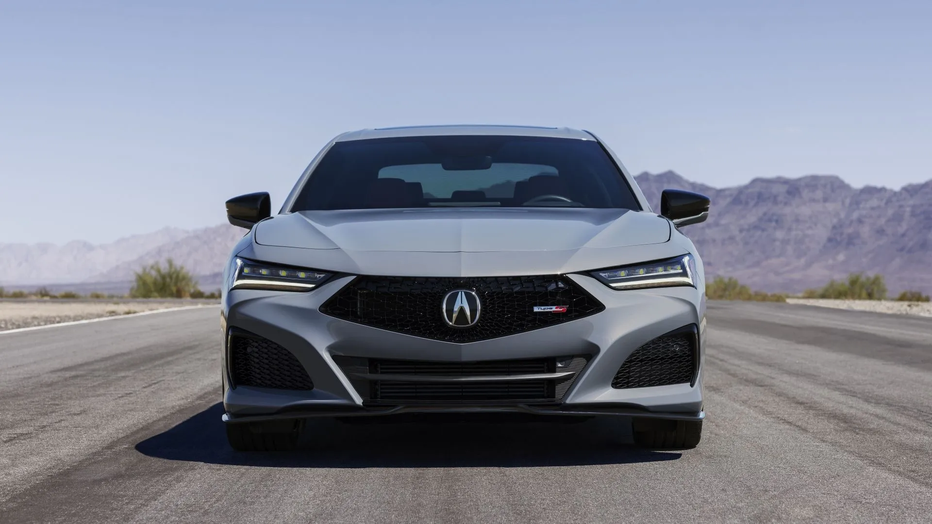 Acura TLX A-Spec 2025 màu đỏ với thiết kế đầu xe sắc nét và hệ thống SH-AWD
