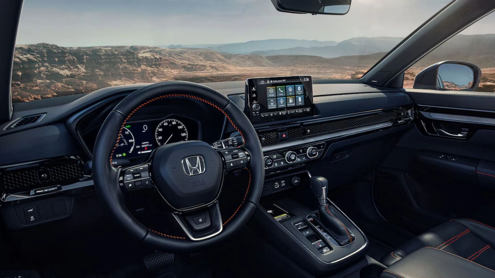 Bảng điều khiển và màn hình thông tin giải trí trên Honda CR-V Hybrid 2025.