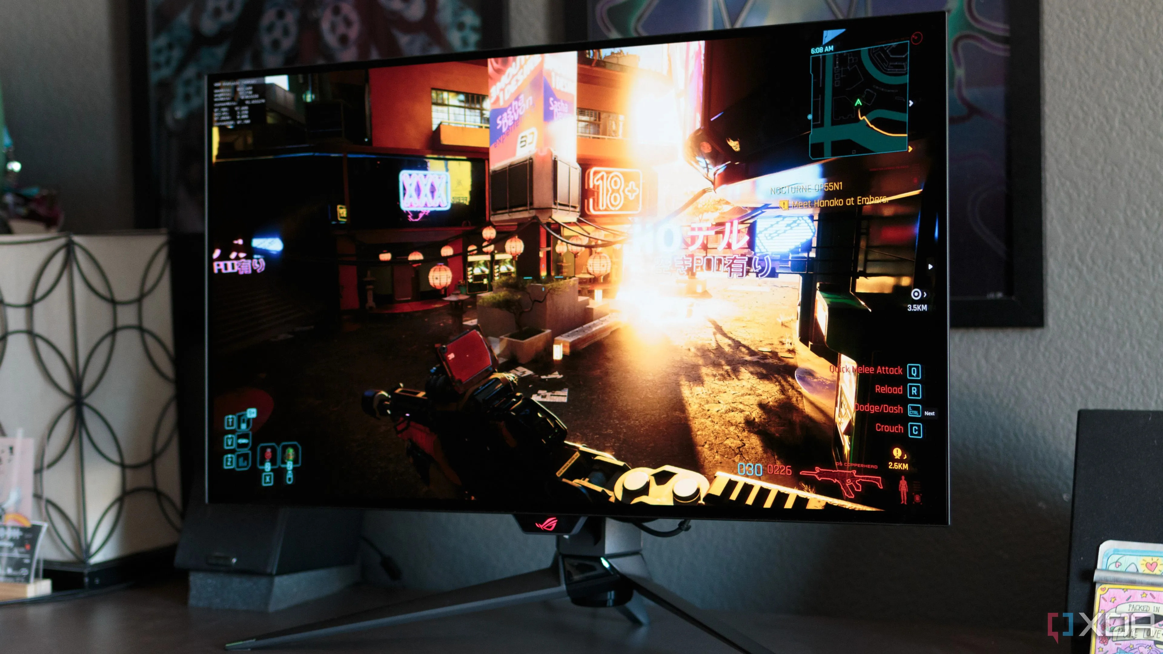 Cảnh game Cyberpunk 2077 hiển thị sắc nét trên màn hình ASUS ROG PG32UCDP, biểu tượng cho sức mạnh đồ họa và những cải tiến đáng kể của game PC hiện đại sau khi được sửa lỗi