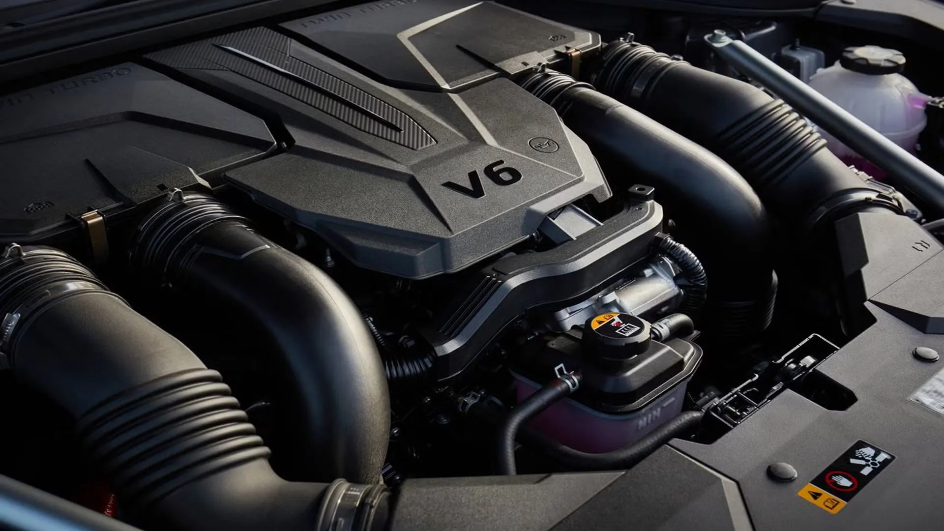 Động cơ V6 Twin-turbo mạnh mẽ của Genesis GV70, biểu tượng cho hiệu suất vận hành ấn tượng của SUV hạng sang này.
