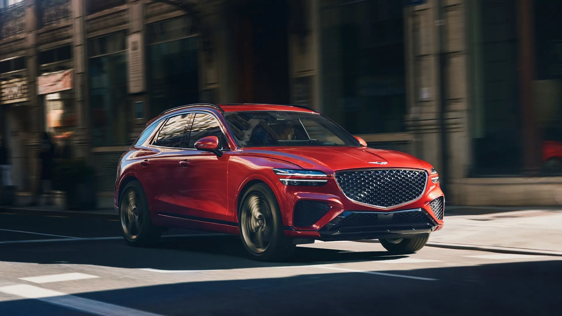 Genesis GV70 2.5T Advanced AWD 2025 màu đỏ lướt phố, nội thất sang trọng và tinh tế