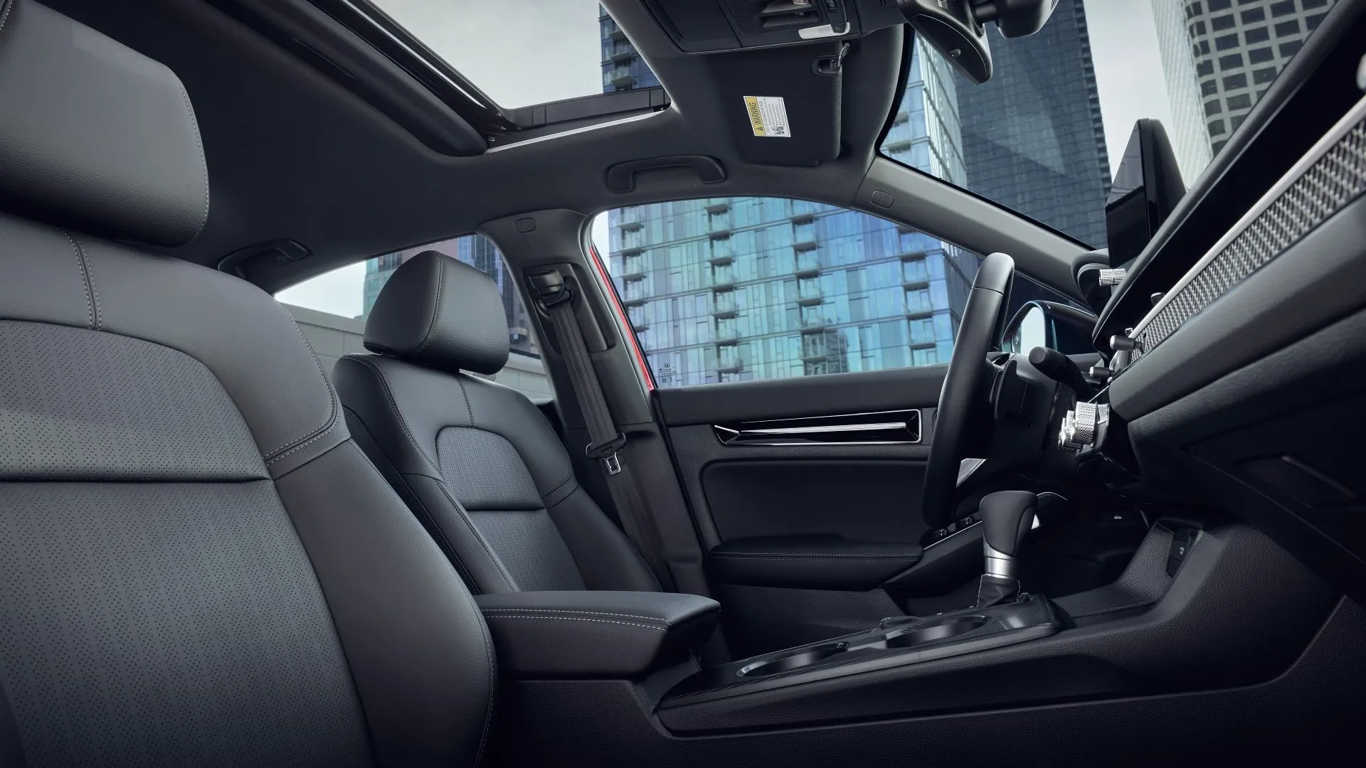 Hàng ghế trước của Honda Civic Sedan Sport Touring Hybrid 2025.