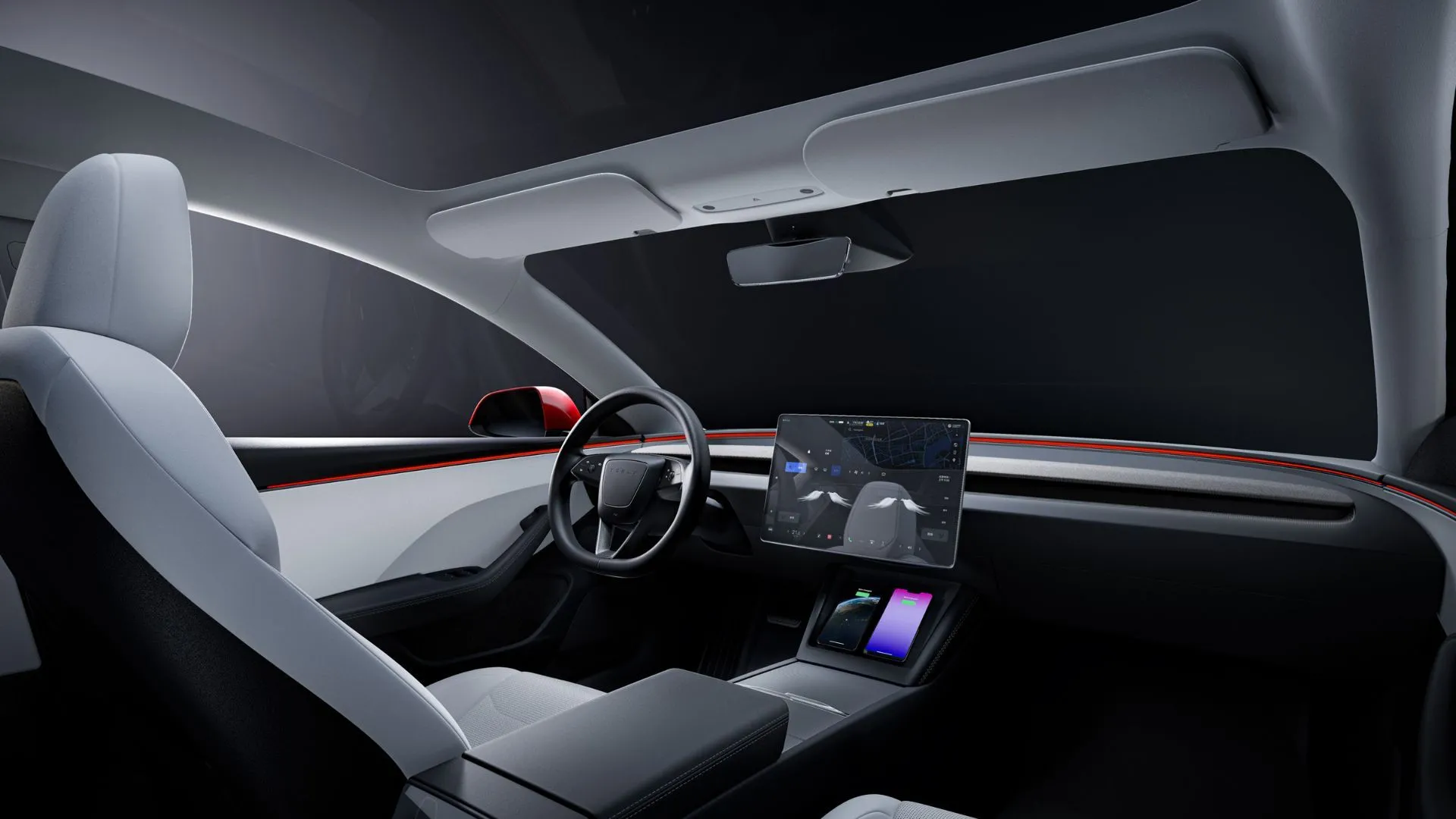 Hình ảnh nội thất của Tesla Model 3 2025 hiển thị ghế màu trắng, vô lăng và màn hình thông tin giải trí