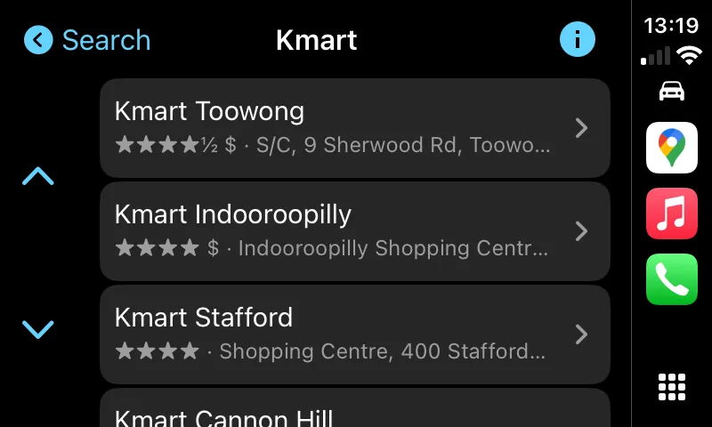 Kết quả tìm kiếm &quot;Kmart&quot; trên Google Maps CarPlay, hiển thị danh sách các địa điểm Kmart gần nhất.