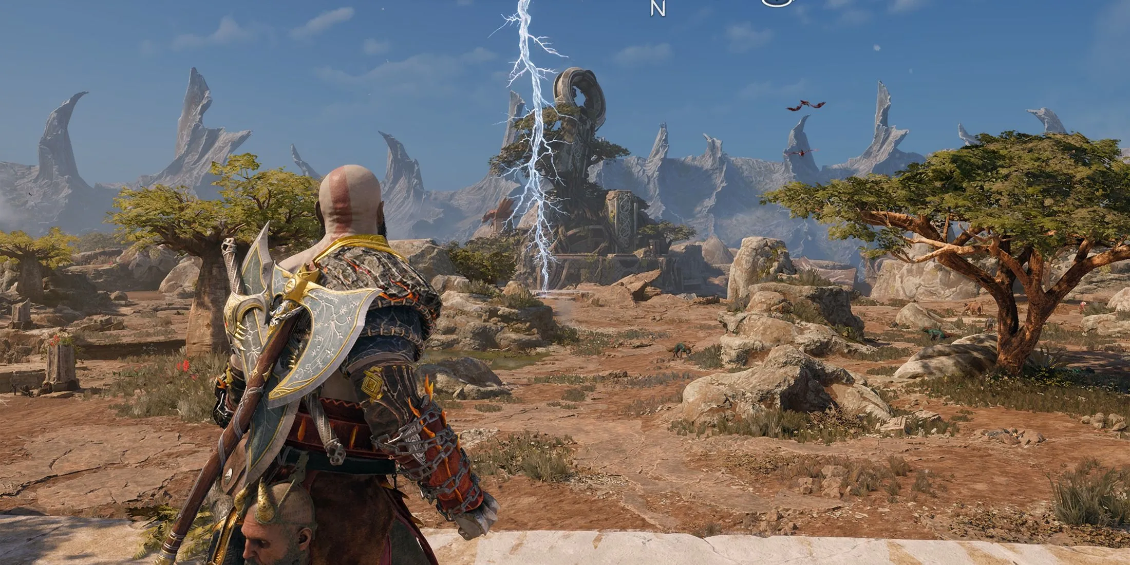 Kratos đứng trong khu vực The Crater đầy sấm sét của God of War Ragnarok.