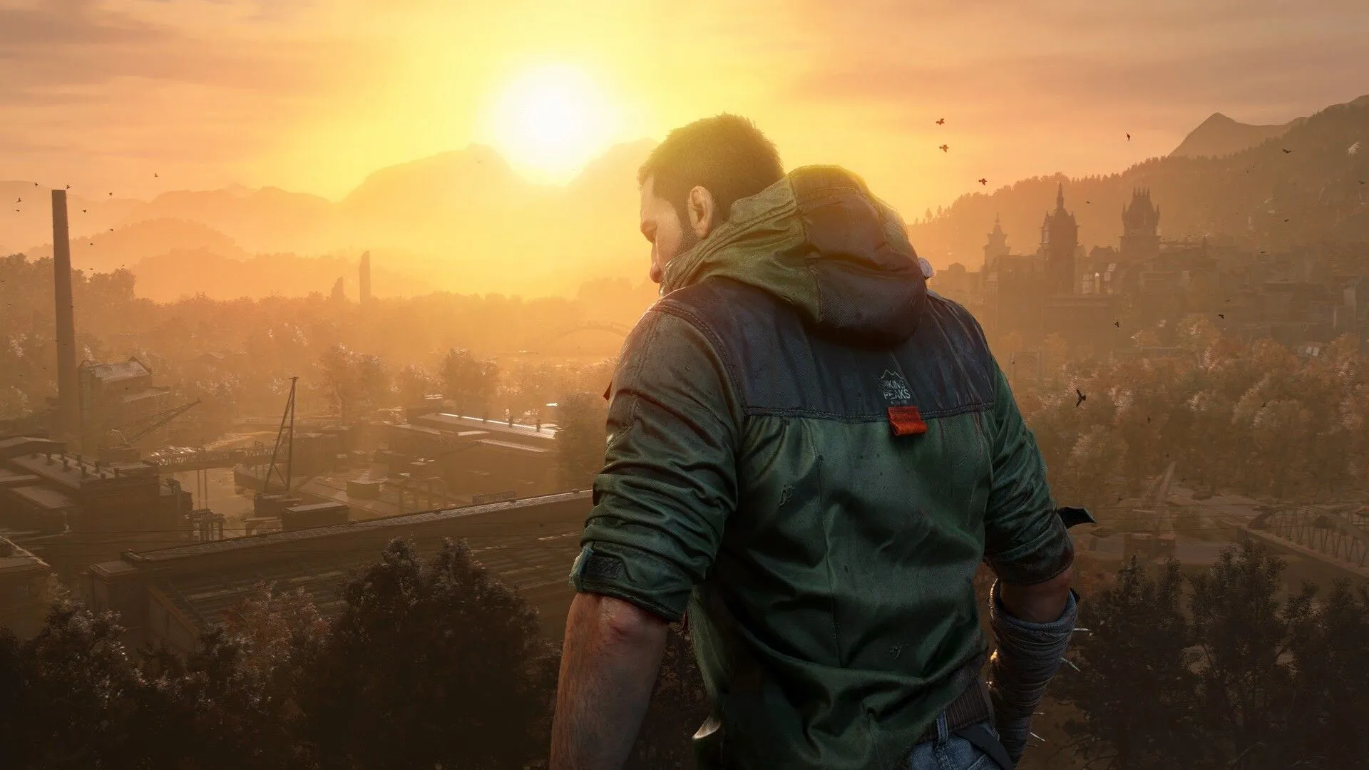 Kyle Crane, nhân vật chính của Dying Light: The Beast, đứng trên tòa nhà nhìn ra khung cảnh hậu tận thế