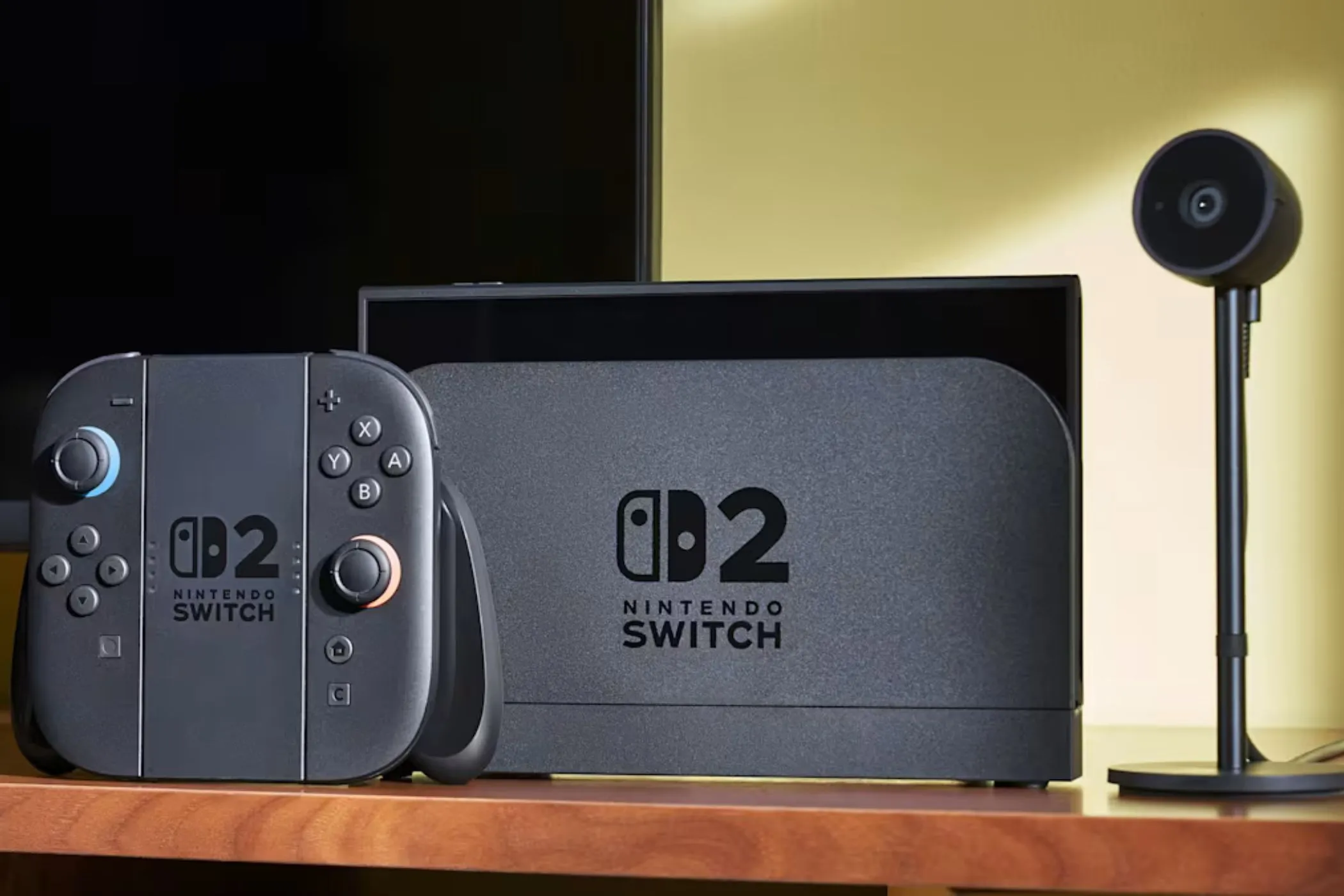 Máy Nintendo Switch 2 cùng phụ kiện camera trên bàn, nhấn mạnh thiết kế linh hoạt và tính di động của hệ máy console
