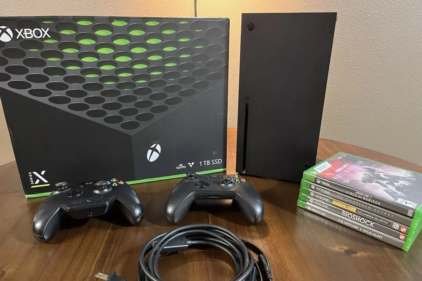 Máy Xbox Series X hiển thị giao diện chứa nhiều biểu tượng game, minh họa tính năng Quick Resume cho phép chuyển đổi nhanh