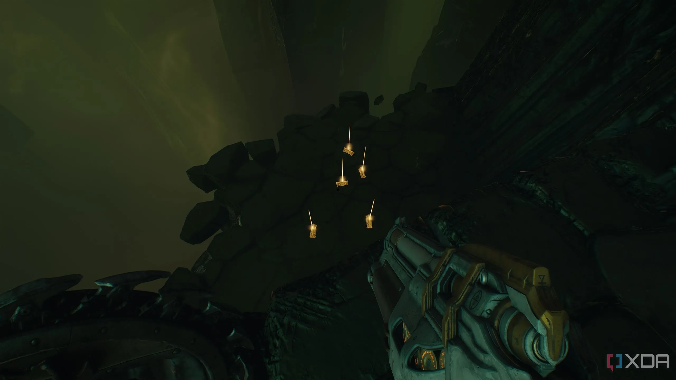 Một bệ thấp hơn với nhiều thỏi vàng phía dưới cổng Shield Portal trong Chapter 15 Doom: The Dark Ages.