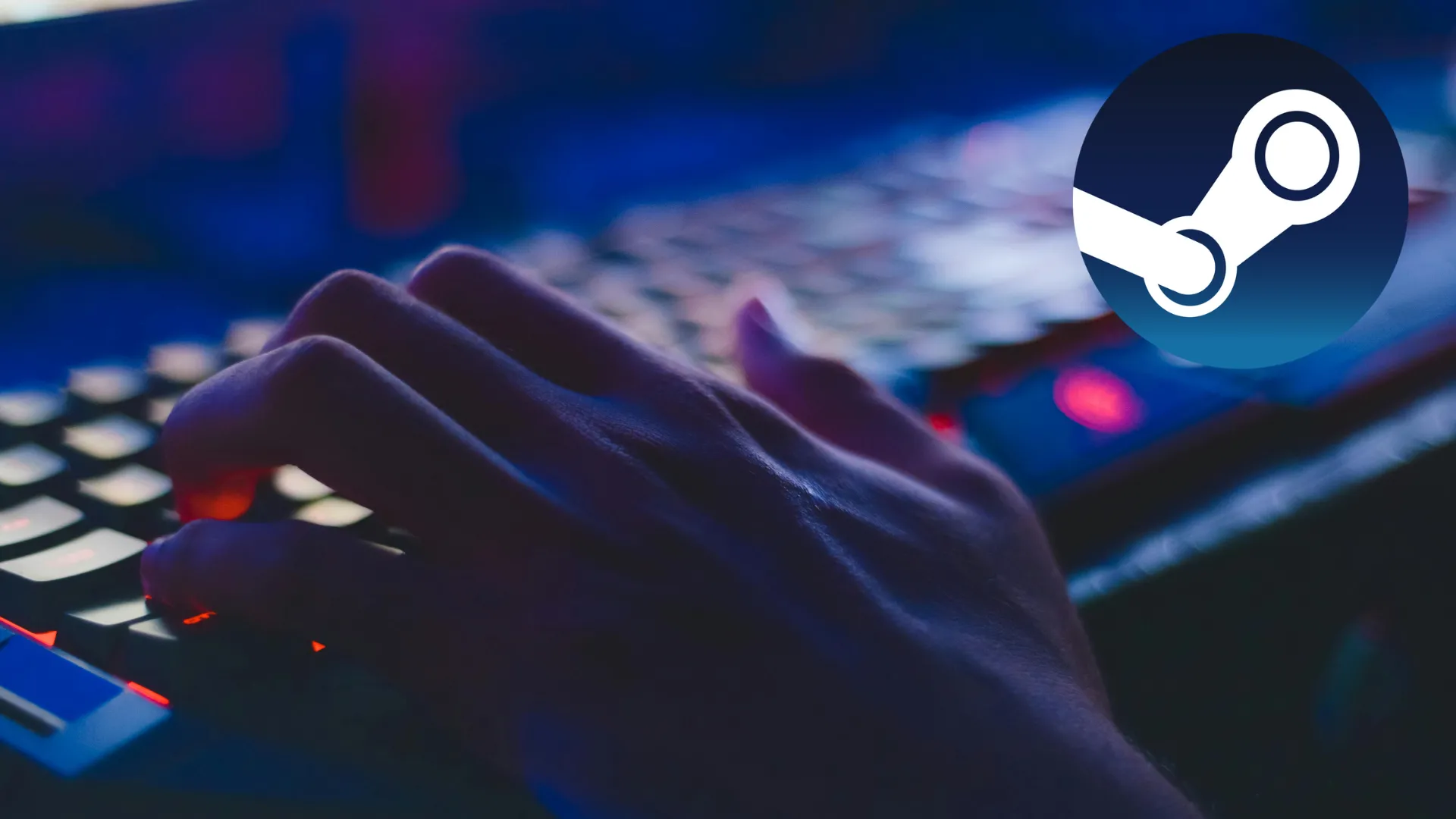 Một người đang gõ bàn phím, màn hình hiển thị logo Steam