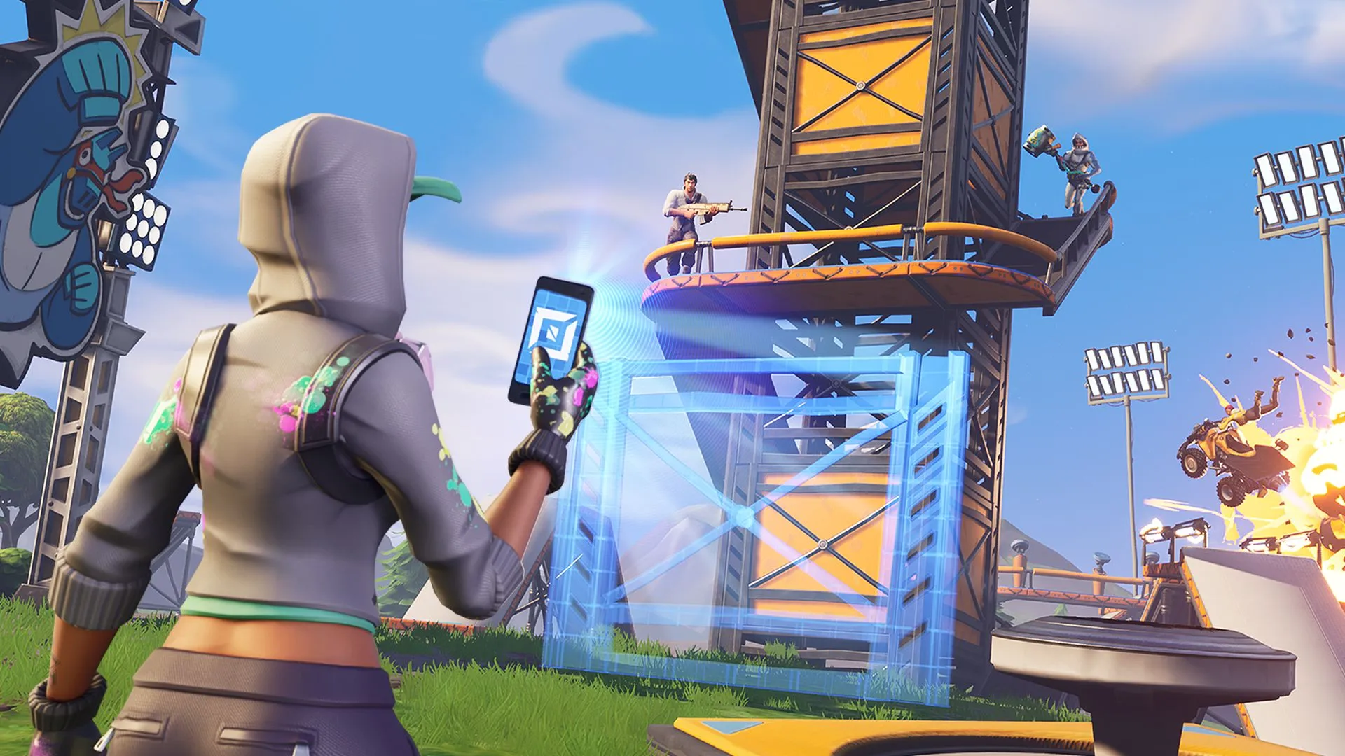 Người chơi nữ trong Fortnite cầm điện thoại chế độ sáng tạo, xây dựng trên tháp canh màu vàng