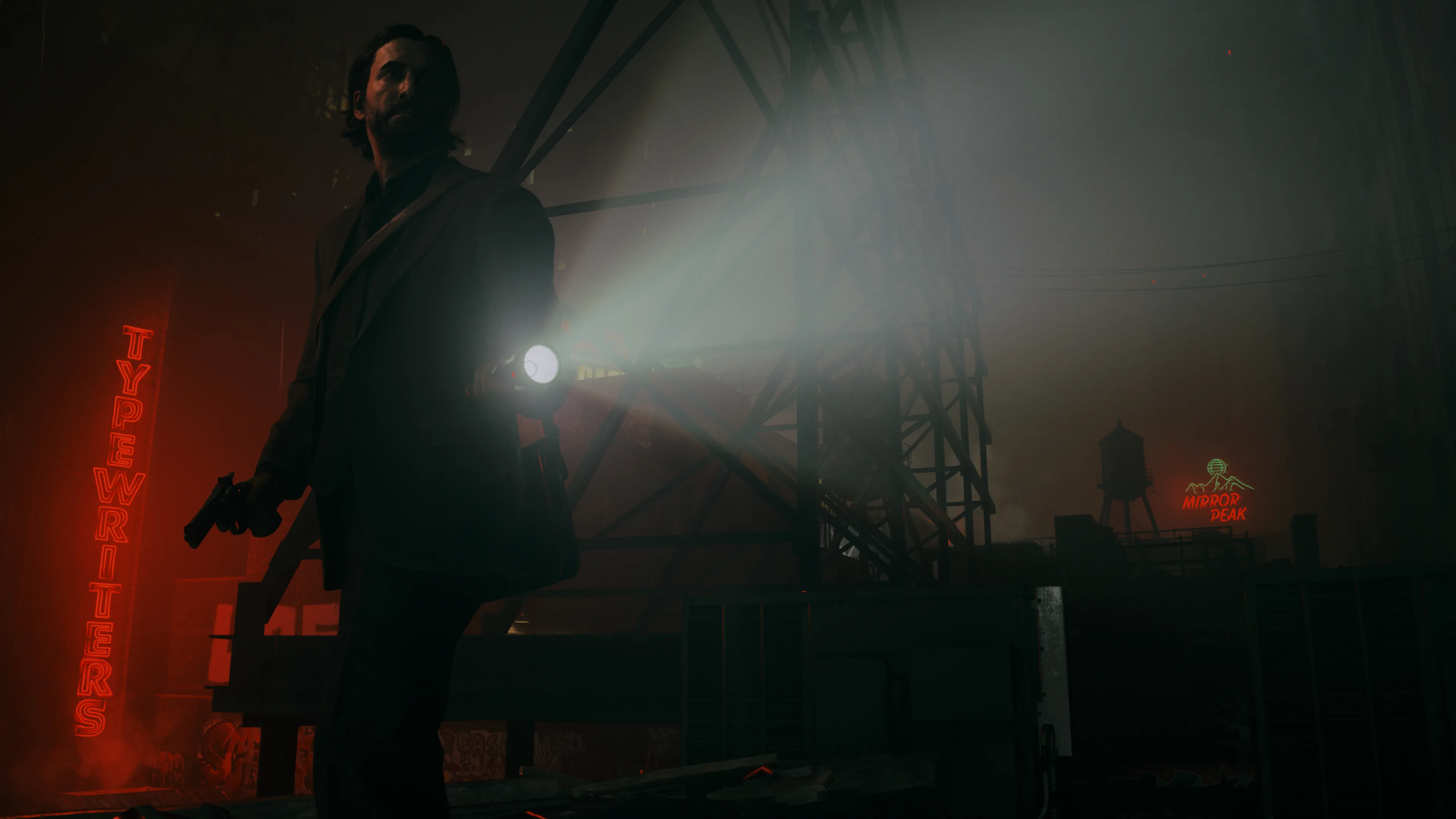 Nhân vật Alan Wake 2 với đèn pin chiếu sáng trong bóng tối